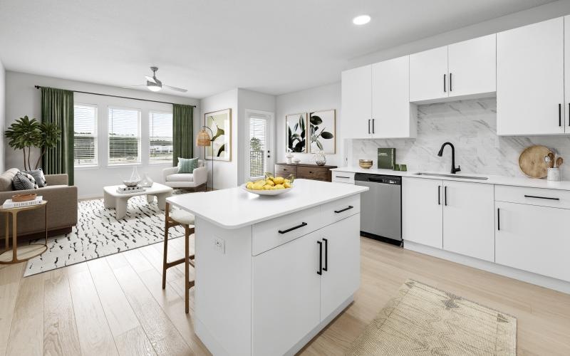 a kitchen with white cabinets